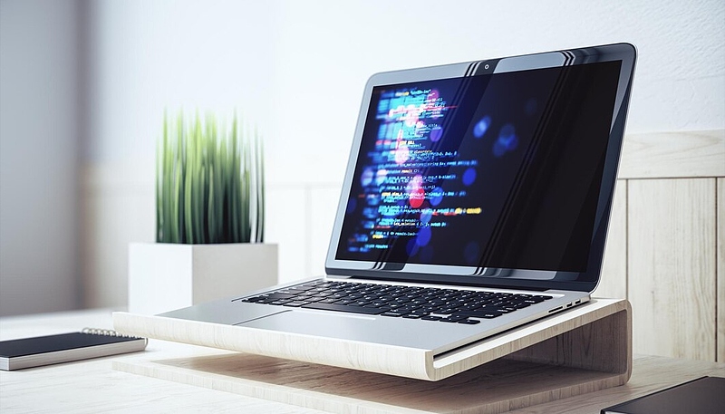 Файл:Laptop-displaying-code-screen-placed-wooden-stand-workspace-with-plant-notebook-minimalist-software-development-concept-3d-rendering 670147-118794.jpg