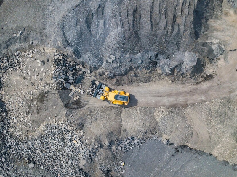 Файл:High-angle-view-earth-mover-digging-land 1048944-8243314.jpg